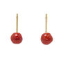 A pair of stud earrings, each with a coral red round glass bead descending from a gold plated top.